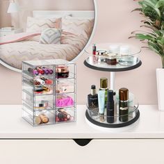 two trays with makeup and cosmetics on top of a white table in front of a mirror