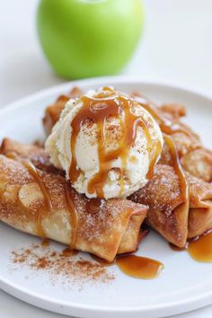 apple pie crepes with ice cream and caramel drizzle on top