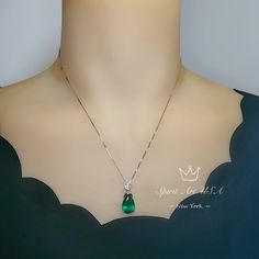 "large emerald Jewelry High Quality unique Artisan design full sterling silver made Gorgeous Luxury Gemstone Dainty Necklace best gift for yourself & you loved her. ◆◆Pendant Main stone:10*14mm created emerald gemstone 6.5ct Pendant Height ( include bail) : 22mm Pendant Holder (bezel & Bail) : White Gold Coated fine 925 Sterling Silver Accent Stone: Sim Diamond ◆◆ Necklace chain : Platinum coated 925 sterling silver Box Chain with length option from 16\" ~20\". The model wearing the defa Green Briolette Emerald Necklace For Formal Occasions, Elegant Emerald Teardrop Necklace, Elegant Pear-shaped Emerald Necklaces, Elegant Pear-shaped Emerald Necklace, Formal Green Briolette Emerald Necklace, Formal Briolette Green Emerald Necklace, Elegant Green Pear-shaped Necklace, Teardrop Emerald Gemstone Necklace For Formal Occasions, Classic Green Pear Shaped Necklace