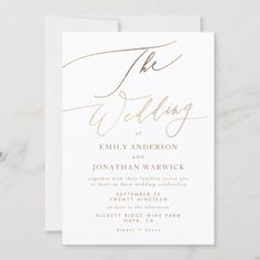 the wedding program card with gold foil lettering on white paper, featuring an elegant calligraphy