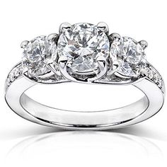 three stone diamond engagement ring in 18k white gold with 0 25 carat round diamonds