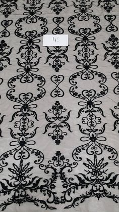 "Black color lace fabric. Sides are not scalloped. Width: 125 cm/49.2 inches Item number: EVS147C www.LaceToLove.com Price is set for one meter/yard. You will receive the fabric in one continuous piece if you purchase more than 1 meter/yard. Actual color may vary greatly form the color you see on screen. It depends on your devices screen brightness/settings. We recommend you to buy a sample before ordering to see the true color. You can purchase a sample here: https://www.etsy.com/listing/248526 Black Scalloped Lace For Wedding, Black Lace With Lace Trim For Party, Black Lace Embroidered Fabric For Wedding, Black Stretch Lace Fabric, Luxury Black Lace With Lace Trim, Black Embroidered Lace Sequin Fabric, Black Lace Fabric, Alencon Lace, French Lace