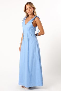 DETAILS  Experience a blend of comfort and style with our Lainey Maxi Dress in Blue. This outfit is defined by its maxi length and a flattering V neckline, complemented by wide straps that close with a double tie for an added touch of elegance. The back mirrors the front with a V design, and the bodice features pleat details for that extra sophistication.  maxi length  v neckline  wide straps with double tie close  back v design  pleat detail on bodice  side invisible zip with hook and eye clasp V-neck Tie Back Maxi Dress For Day Out, Chic V-neck Maxi Dress With Knotted Straps, Summer V-neck Maxi Dress With Tie Fastening, V-neck Midi Dress With Tie Straps For Vacation, V-neck Maxi Dress With Tie Straps For Day Out, Chic Fitted Maxi Dress With Tie Fastening, Blue Maxi Dress With Tie Spaghetti Straps, Blue Maxi Dress With Spaghetti Tie Straps, V-neck Maxi Dress With Tie Waist