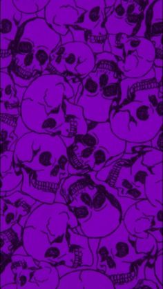 a lot of skulls on a purple background