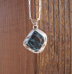 Beautiful and unique black stone with baby blue matrix throughout. Artist: P. Sanchez. Found in our Rodger Collection. Handmade in the USA. Handmade Black Jewelry With Square Pendant, Black Stone, Matrix, Baby Blue, Electricity, Stone, Blue, Black