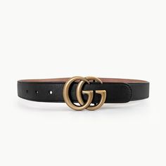 This Gucci "Junior" belt is a smaller version of the regular Double G Marmont buckle belt. Designed for girls but suitable for small adult women. Waist size range 24 - 27 inches. Made of black calf leather lined with natural untreated soft leather.  Buckle in antique gold. RFID tag embedded for authenticity verification.  CONDITION: Very good overall, with minor surface wear on the buckle; some patina, liquid marks, and light stains on the lining due to the untreated nature of leather; impressio Designer Black Belt Buckles With Belt Included, Designer Black Belt With Buckle, Designer Black Belt With Buckle Closure, Designer Black Belts With Buckle Closure, Designer Adjustable Black Belt, Classic Belt With Gold Buckle And Adjustable Fit, Designer Black Belt With Gold Buckle, Luxury Adjustable Belt With Buckle, Rfid Tag