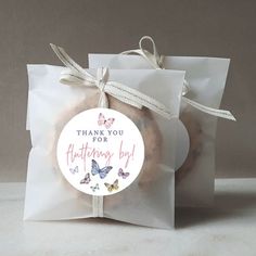 a cookie in a bag with a thank you for valentine's day tag on it