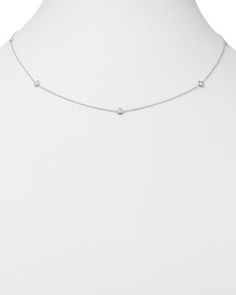 Diamond stations line up along a classic 14K white gold chain, lending a versatile, timeless look for both everyday and special occasions. White Gold Fine Jewelry Station Necklace, Classic White Gold Diamond Necklace With Delicate Chain, Classic White Gold Station Necklace For Formal Occasions, Elegant White Diamond Necklace With Cable Chain, Dainty White Gold Station Necklace For Anniversary, Elegant Diamond Station Necklace With Cable Chain, Classic Station Necklace With Brilliant Cut, Classic Diamond White Diamond Necklace With Cable Chain, Diamond Necklace With Round Cut Cable Chain