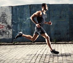 a man running on a brick road