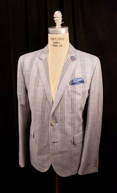 "Incredible Single Breasted Classic Style Sport Coat with wonderful detailing. Lightweight wool. Not your average sportscoat but a masterpiece by none other than Ted Baker. Bold shoulders, notch lapels, incredible coloring, complimented by beautiful bowtie interior lining. This is a perfect \"Business Attire\" must have. Great bold stripe windowpane lightweight fabric with greys, black, pink, orange, red and blue. Add your favorite vintage Fedora and hit the town. This blazer is in amazing new c Custom Fit Long Sleeve Winter Suits, Tailored Single Button Sport Coat With Long Sleeves, Custom Fit Single Breasted Long Sleeve Suits, Winter Fitted Sport Coat With Suit Collar, Fitted Sport Coat With Suit Collar For Winter, Custom Fit Notch Lapel Outerwear For Winter, Semi-formal Custom Fit Long Sleeve Outerwear, Fall Single-breasted Custom Fit Outerwear, Semi-formal Fitted Sport Coat With Long Sleeves