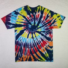 Tie-Dye Shirt Large Multicolored Crew Neck Cotton T-shirt Casual Unisex Tee  Excellent Pre-owned Condition  Size: Large  Color: Blue, Yellow, Red Tie-Dye  100% Cotton  Machine Washable  See photographs for MEASUREMENTS *To ensure the best fit, please measure the chest and total length of your favorite-fitting shirt and compare measurements to those of this particular item Same Day - Next Business Day Shipping Express your vibrant personality with this colorful tie-dye shirt from Call Your Mother Summer Multicolor T-shirt With Rainbow Print, Cotton Tie Dye T-shirt With Rainbow Print, Multicolor Rainbow Print T-shirt For Summer, Colorful Rainbow Print Summer T-shirt, Casual Multicolor Short Sleeve T-shirt, Multicolor Rainbow Print T-shirt With Short Sleeves, Casual Colorful T-shirt With Rainbow Print, Casual Multicolor Rainbow Print Shirt, Casual Multicolor Print Cotton T-shirt