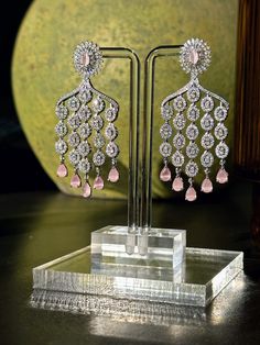 Cubic Zirconia Earring with Rhodium Plating Comes in 3 different colors (Blush Pink, Sapphire Blue, and Mint). Length: 75 mm Width: 32 mm Diamond Chandelier Earrings, Diamond Chandelier, Back Jewelry, Cubic Zirconia Earrings, Wedding Jewelry Earrings, Zirconia Earrings, Sapphire Blue, Anaheim, Wedding Earrings