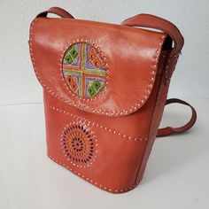 Nwt Genuine Leather Handmade Embroidered And Carved Bag. This One Of A Kind Bag Is All Handmade With Genuine Leather. It Is Imported For My Boutique And Specially Designed. Look At The Beautiful Embroidery And Carving Done On Both Sides Of The Bag. Bag Comes With A Long Belt To Carry It As Cross Body Bag. A Perfect Valentines Day Gift Or A Good Gift For Any Occasion. Carry It Everyday Or Take It On Your Special Occasion As A Statement Peice. All The Bags In My Boutique Are Handmade Hence The Scu Hand-stitched Travel Bags, Leather Hand-stitched Shoulder Bag, Embroidered Leather Satchel Bag, Embroidered Leather Crossbody Bag, Leather Embroidered Shoulder Bag For Travel, Red Embroidered Leather Shoulder Bag, Embroidered Leather Bags For Daily Use, Embroidered Leather Satchel Shoulder Bag, Embroidered Leather Shoulder Satchel