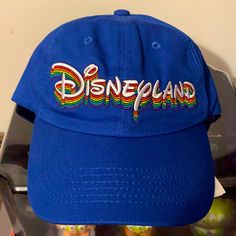 Brand New Disneyland Park Rainbows Emblem Baseball Hat One Size Blue Hats With Embroidered Logo And Curved Brim, Casual Blue Hats With Embroidered Logo, Fun Blue Flat Brim Baseball Cap, Fun Blue Hat With Curved Brim, Blue Hat With Embroidered Logo, Blue Hats With Embroidered Logo, Blue Fun Baseball Cap One Size, Fun Blue Visor Baseball Cap, Fun Blue Baseball Cap One Size Fits Most