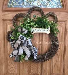 a dog themed wreath on the front door