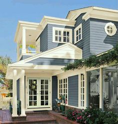 a blue house with the words how to choose an exterior paint sheer