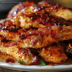 the chicken is covered in sauce and garnished with parsley