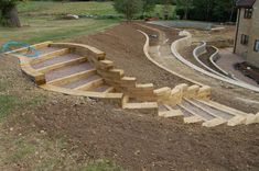 the steps are made out of wood and sand