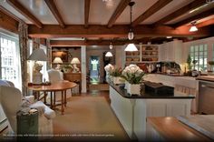 the kitchen is clean and ready to be used as a living room or dining area