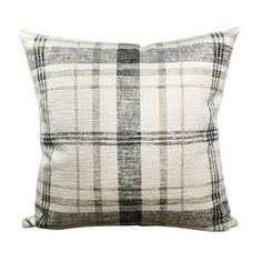 a black and white plaid pillow on a white background