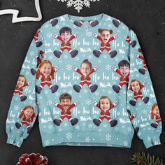 a christmas sweater with the image of two children on it