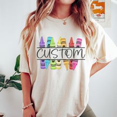 ---------- Ordering Your Custom Design T-shirt: Step by Step ---------- 1. Select your preferred t-shirt color. 2. Specify your desired size. 3. Pick the color for both your design and text. 4. Ensure that each step of your order is accurately completed. M A T E R I A L S → Our solid color options such as White and Black consist of 100% Cotton. → The Heathered Colors are a blend of cotton and polyester, ensuring a luxuriously soft feel. → Crafted as Short Sleeve Crew-Neck Unisex T-Shirts. → Composed of soft, high-quality Sueded Jersey fabric. → Taped shoulder-to-shoulder for enhanced durability. → Side Seamed for a refined finish. → Boasts a Retail fit for a stylish look. S I Z E → Refer to our size chart available in the listing photos for accurate sizing information. S H I P P I N G & P Customizable Fun Multicolor T-shirt, Customizable Crew Neck School T-shirt, Customizable Cotton T-shirt For Back To School, Customizable Cotton T-shirt For School, Fun Customizable Cotton Shirt, Casual Multicolor Tops With Custom Artwork, Customizable Short Sleeve T-shirt For Back To School, Custom Print Multicolor T-shirt For Customization, Customizable Cute Tops For School