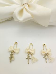 Baptism Martyrika Witness Pins for Baptism / Wedding Zircon cross / Tiny bow and tassel details Safety pin Quantity available Handmade in Greece Come all in nicely box ♥ More options here : https://www.etsy.com/shop/eAGAPIcom?ref=seller-platform-mcnav&section_id=16348716 ♥ OPTIONS after contact Order each favor in box ,pouch, tag or ribbons Order with personalized tag Add initials charms,meaning or symbol charms Order twins design Change Cross, beads's color, cord , theme Order as supply Ord Elegant Gold Baptism Dress, Charms Meaning, Boy Christening, Box Pouch, Tiny Bow, Rhinestone Cross, Guest Gifts, Wedding Item, Initial Charm