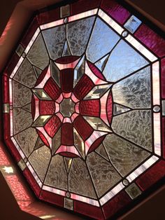 a circular stained glass window in the ceiling