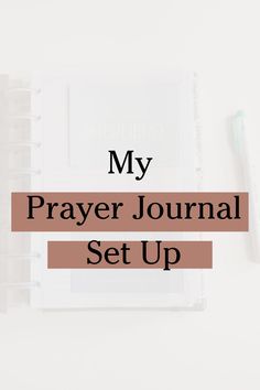 a notebook with the words my prayer journal set up