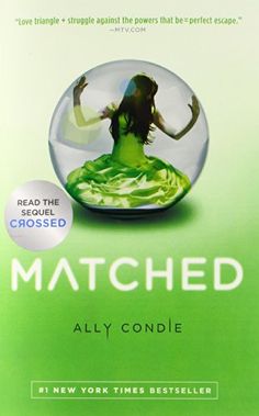 the book cover for matched by ally condie, with an image of a woman in a green dress