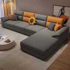 a living room filled with furniture and a large sunflower