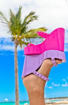 Our best selling jelly shoes since we started! This style is timeless and perfect for the beach and a cocktail party.

This platform wedge is made of our high-quality jelly with studded straps, cushioned inner sole, and well-defined ridges on the outsole. They are water resistant and weatherproof. Shop this and other jelly shoes today Pvc Sandals With Round Toe For Summer, High Heel Pink Wedge Sandals For Beach Season, Plastic Open Toe Jelly Sandals For Party, Pink High Heel Wedge Sandals For Beach Season, Open Toe Plastic Jelly Sandals For Party, Plastic Open Toe Sandals For Party, Pink Synthetic Wedge Sandals For Beach Season, Pink Wedge Sandals For Beach Season, Trendy Pvc Sandals For Summer