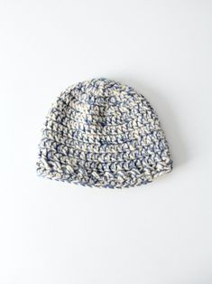 "This is a vintage hand knit winter hat. The beanie features a two tone knit pattern in cerulean blue and creamy-white. CONDITION In good condition with wear consistent with age and use. APPROXIMATE FIT: Most (large) MEASUREMENTS Circumference: 25\" ... 63.5 cm Length/Height: 8.5\" .. 21.6 cm 12103" Blue Warm Crochet Hat, Blue Knit Winter Hat, Blue Knitted Beanie One Size, Blue Warm Crochet Yarn Hat, Blue Crochet Hat For Cold Weather, Blue Knitted Cap Beanie, Blue Knitted Beanie Cap, Blue Knitted Winter Beanie, Blue Hand Knitted Beanie For Winter