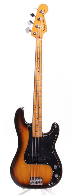 an electric bass guitar is shown against a white background