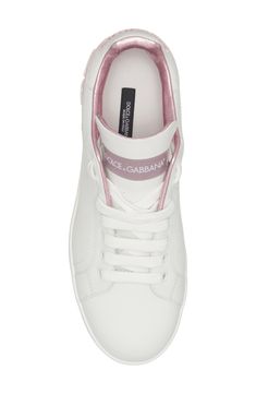 In Dolce&Gabbana's typical glamorous fashion, this low-top leather sneaker stands out with metallic-pink trim. A micro-injected rubber logo at the heel amps up the statement factor. 3/4" platform (size 38.5) Lace-up style Removable insole Leather upper and lining/synthetic sole Made in Italy Salon Shoes Designer Custom Sneakers With White Sole, White Sole Sneakers With Embroidered Logo, Pink Platform Sneakers With Synthetic Material, Luxury Pink Lace-up Custom Sneakers, Luxury Pink Low-top Sneakers, Pink Low-top Sneakers With Embroidered Logo, Pink Synthetic Platform Sneakers, Luxury Pink Leather Sneakers, Pink High-top Platform Sneakers With Textured Sole