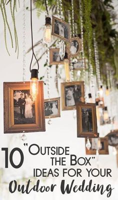 an outdoor wedding with pictures hanging from the ceiling