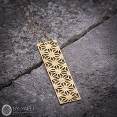 "Hammered Rectangular pendant with geometric pattern so simple so beautiful. ♥WANT TO MAKE IT PERSONAL? ♥ Add a charm letter to your necklace - Add this item: https://www.etsy.com/il-en/listing/687931684 ★ Comes in our signature gift box, ready for gift giving. ★ Available in Gold [18k Gold filled chain & gold plated brass pendant] ★ Pendant size is 2\"x0.50\" (52x13 mm). ★ Handmade ★For more geometric jewelry click this link: https://www.etsy.com/shop/ByYaeli?ref=seller-platform-mcnav&s Rectangular Brass Jewelry Gift, Elegant Rectangular Brass Necklace, Geometric Yellow Gold Jewelry As Gift, Geometric Yellow Gold Jewelry Gift, Geometric Yellow Gold Jewelry For Gift, Geometric Yellow Gold Jewelry For Gifts, Geometric Gold Jewelry Gift, Gold Rectangular Necklaces As Gift For Her, Rectangular Gold Necklace Gift For Her