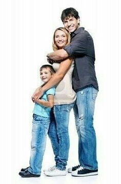 a man, woman and child are standing in front of a white background with their arms around each other