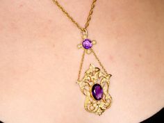 Antique 1910s 4.83 Carat Amethyst and Pearl Yellow Gold Pendant For Sale at 1stDibs Elegant Purple Locket Jewelry, Vintage Amethyst Yellow Gold Necklace, Vintage Amethyst Necklace In Yellow Gold, Antique Amethyst Yellow Gold Jewelry, Elegant Engraved Purple Necklace, Heirloom Purple Pendant Necklace, Purple Heirloom Pendant Necklace, Design Frame, Art Nouveau Design