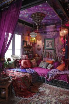 a bedroom with purple curtains and lots of pillows