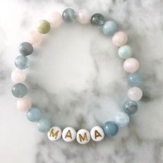 a beaded bracelet with the word mama written on it