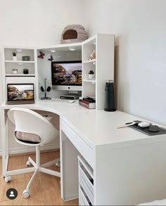 a white desk and chair in a room