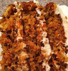 a piece of carrot cake on a white plate