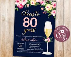 this is an image of a 50th birthday party card with flowers and wine glasses on it