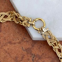 Estate/ vintage 14KT yellow gold open weave interlocking links style 15” necklace with toggle clasp. Very good condition, see pictures. Weighs approx.: 13.90 Grams 15”length, but may feel snugger on due to thickness. Very Good Estate Condition Toggle Clasp Design Luxury Gold Toggle Necklace, Luxury Modern Jewelry With Toggle Clasp, Luxury Gold Lariat Toggle Necklace, Luxury Gold Link Toggle Necklace, Luxury Elegant Chain Necklace With Toggle Clasp, Luxury Gold Toggle Clasp Necklace, Luxury Yellow Gold Round Toggle Necklace, Luxury Gold Round Toggle Necklace, Luxury Classic Gold Chain Toggle Necklace