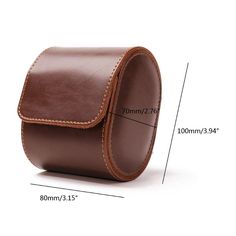 This elegant Jules Leather Single Watch Roll Case is the perfect accessory for any gentleman who has a penchant for watches. Crafted of soft yet durable leather with an easy snap closure system, this case is a perfect solution to keep your favourite timepiece safe from bumps or scratches while travelling. 
Material:

Leather


Dimensions:

3.15 * 2.75 * 3.93 in / 8 x 7 x 10 cm Watch Roll Case, Leather Watch Roll, Single Travel, Watch Storage Box, Leather Storage, Watch Roll, Watch Boxes, Jewelry Stand, Watch Box