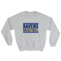 Raven Basketball Sweatshirt, Ravens Basketball, Ravens Spirit Wear, Raven Spiritwear, Ravens Mom, Raven Dad, Sweatshirt A sturdy and warm sweatshirt bound to keep you warm in the colder months. A pre-shrunk, classic fit sweater that's made with air-jet spun yarn for a soft feel.  * 8.0 oz., 50/50 cotton/polyester * Pre-shrunk * Classic fit * Reduced pilling and softer air-jet spun yarn * 1x1 athletic rib knit collar, cuffs and waistband, with spandex * Double-needle stitched collar, shoulders, a Spirit Wear Designs, Basketball Sweatshirts, School Spirit Wear, Spirit Wear, Sports Mom, Soft Air, Baseball Shirts, Fitted Sweater, Ravens