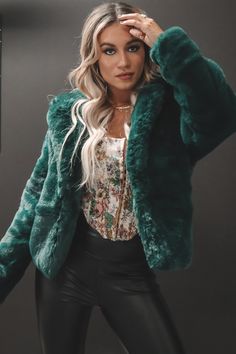 Dark green faux fur jacket- Over-sized lapels- Full-length sleeves- Slightly cropped bodice- Hook & eye closure- LinedModel Kahsia is 5'7 wearing a small SHOP THE LOOK Long Sleeve Faux Fur Coat For Parties, Party Long Sleeve Faux Fur Coat, Spring Faux Fur Long Sleeve Coat, Faux Fur Long Sleeve Party Outerwear, Faux Fur Long Sleeve Outerwear For Party, Trendy Faux Fur Coat For Spring, Trendy Spring Faux Fur Coat, Fitted Faux Fur Outerwear With Long Sleeves, Long Sleeve Faux Fur Outerwear For Parties