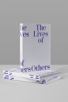 three books stacked on top of each other in front of a gray background with the words, the lives lives of others