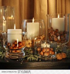 candles and nuts are arranged on a table